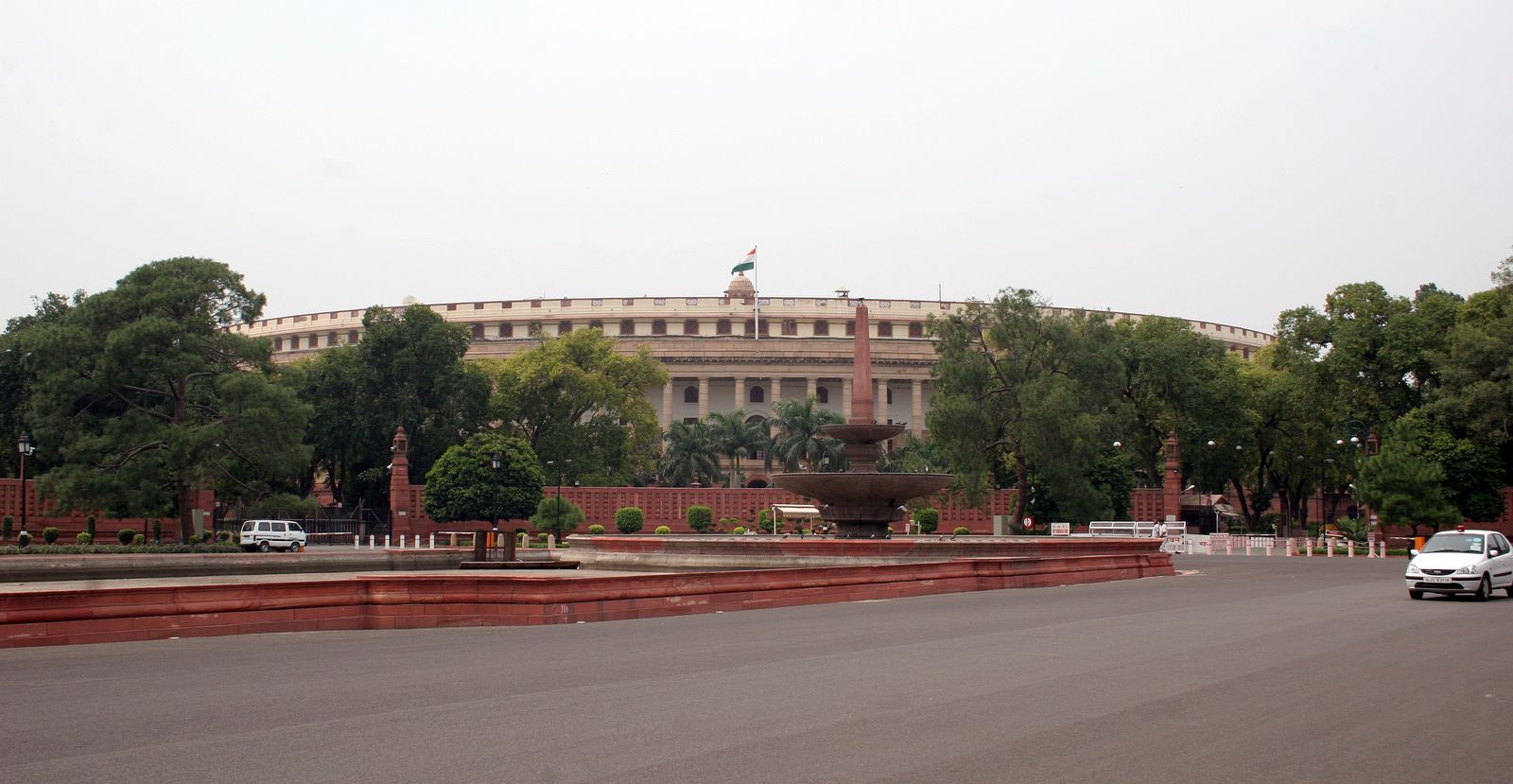The circular colonnade of Sansad Bhavan, the old Parliament House in New Delhi, across its lawn