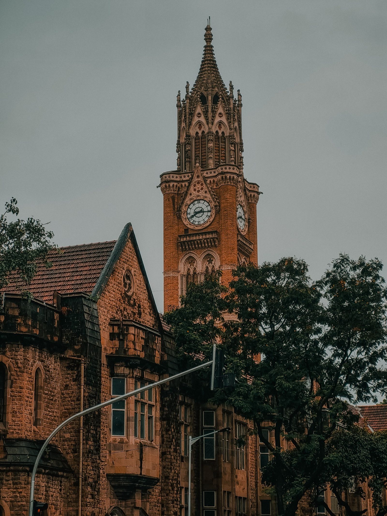 The Gothic stone Rajabai Clock Tower rises over Mumbai.