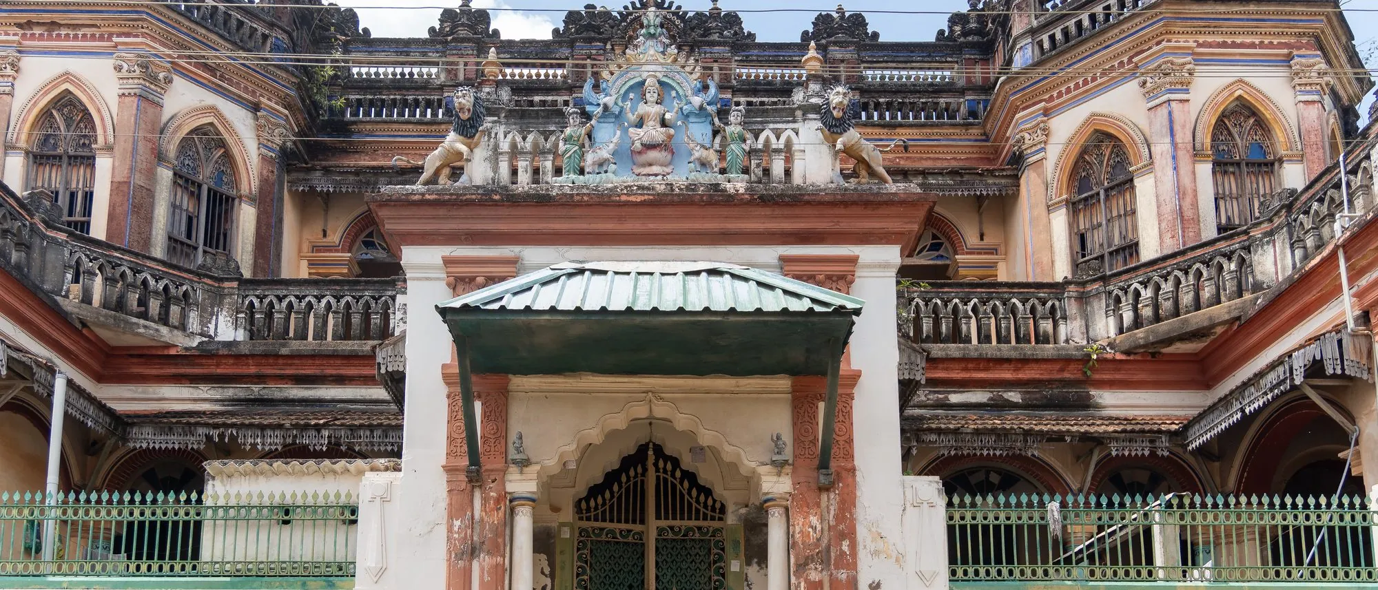 The ornate symmetrical facade of a Chettiar mansion in Kanadukathan, Chettinad, Tamil Nadu