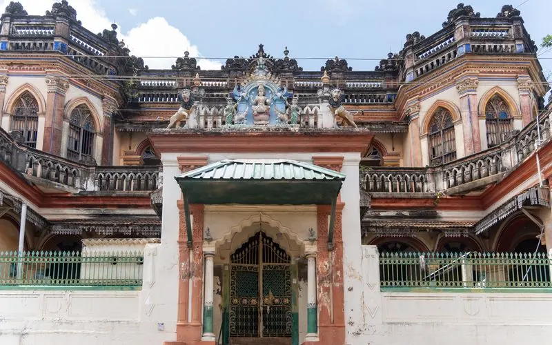 The ornate symmetrical facade of a Chettiar mansion in Kanadukathan, Chettinad, Tamil Nadu