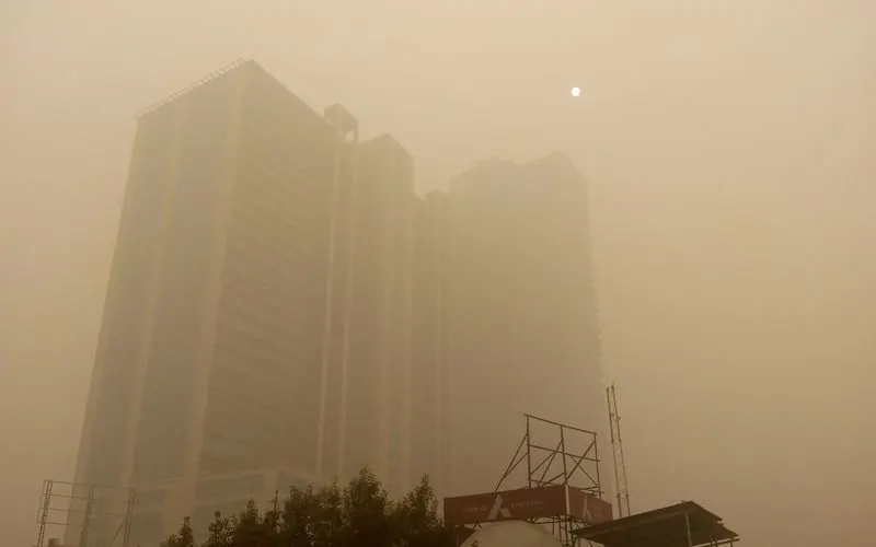 High-rise towers fading into thick brown smog in Delhi, November 2017